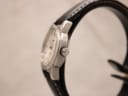Side profile of Tissot PR 50 stainless steel case and crown.