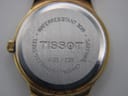 Detail of the Tissot Stylist black leather strap.