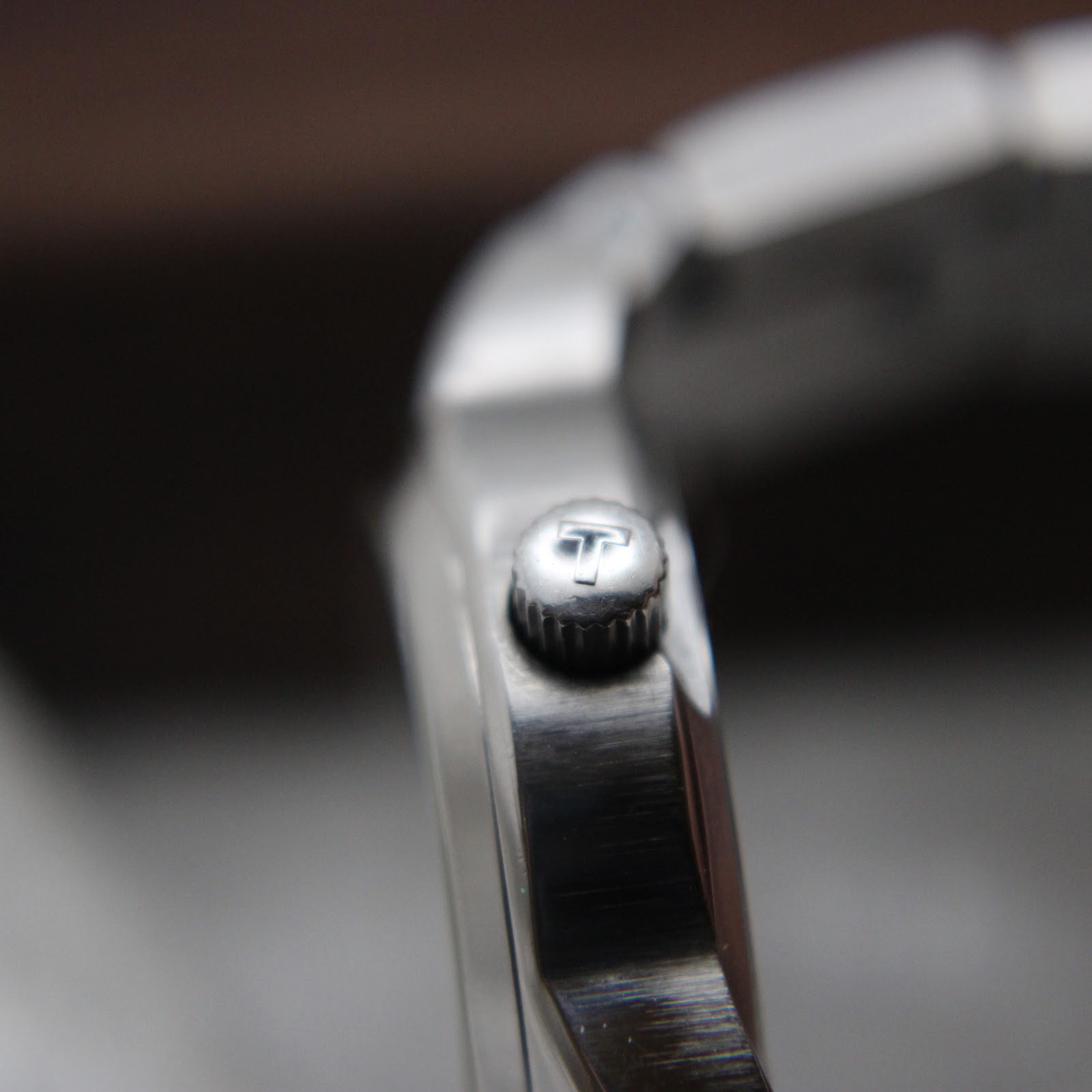 Rear view of Tissot PR 100 case back with reference number and water resistance.