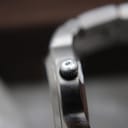Rear view of Tissot PR 100 case back with reference number and water resistance.