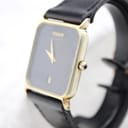 Side profile of the Tissot watch, showcasing its slim gold-tone case and crown details.
