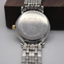 Close-up of the stainless steel case back, engraved with "TISSOT SINCE 1853", model reference T 825/925, "SAPPHIRE CRYSTAL", "WATERRESISTANT 30M", and serial number.