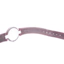 Close-up of the red leather strap's interior, showing the stitched detailing and some wear consistent with age.