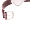 Close-up of the silver-tone buckle, clearly showing the "TISSOT" engraving.