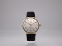 Front face of Tissot Seastar Seven automatic watch with silver dial.
