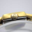 Detailed close-up of the signed crown with the Tissot 'T' logo.