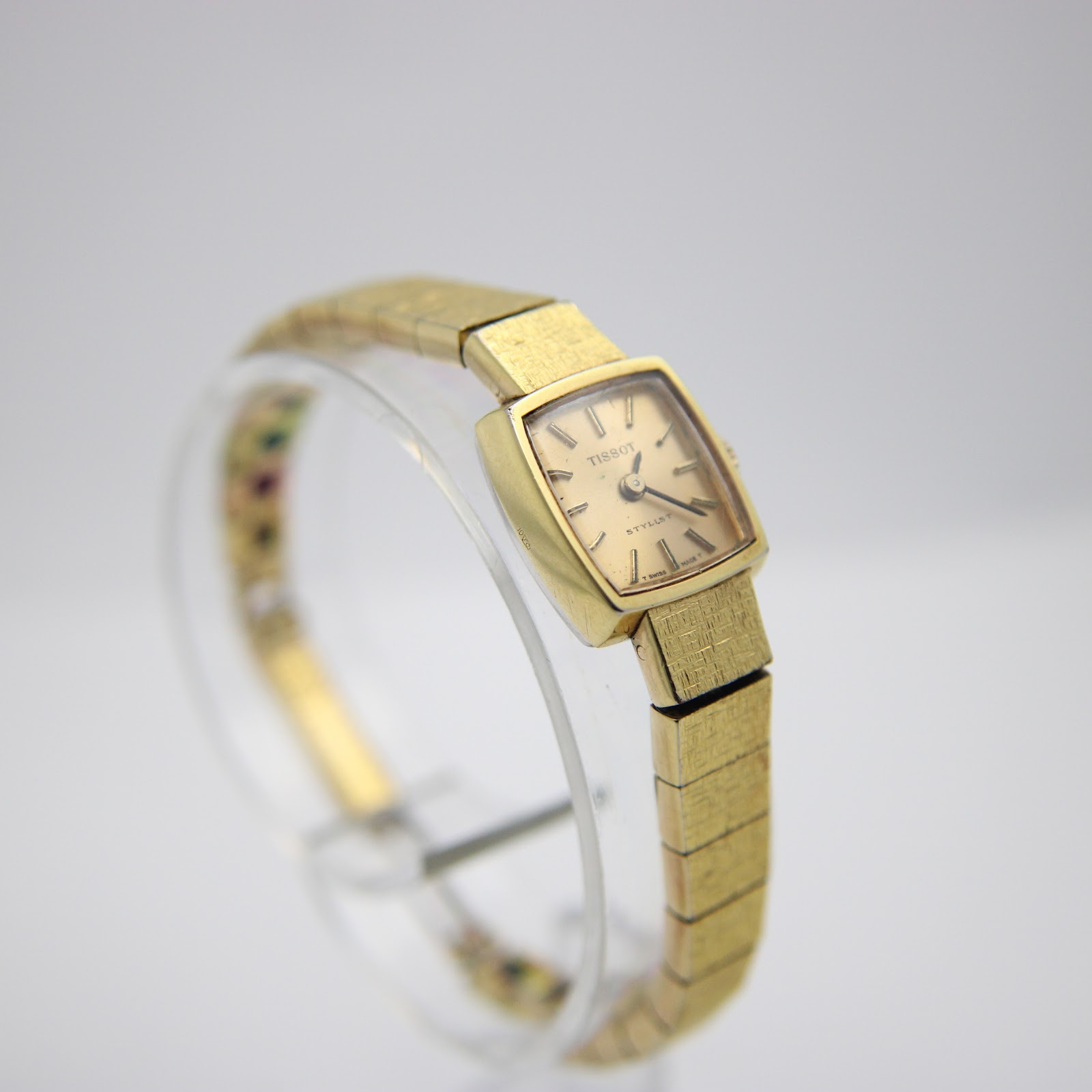 Another angled front view, slightly different perspective, showing the textured bracelet.