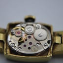 Close-up of the Tissot Calibre 2403 manual wind movement inside the open case.