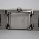 Close-up of the stainless steel case back, clearly showing "Tissot 1853", "L840 K", "Water Resistant 30M", "Sapphire Crystal", and "Stainless Steel" engravings.