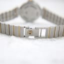 Close-up of the two-tone bracelet deployment clasp with the Dunhill logo.
