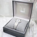 Dunhill watch presented in its original dark grey and gold-accented presentation box.