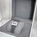 Christian Dior D78-109 watch nestled inside its original white presentation box on a grey cushion.