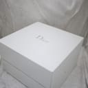 Original Christian Dior presentation box in white with "Dior" logo.