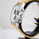 Side view of Mercedes-Benz SLK watch, showing polished stainless steel case, crown, and pushers.