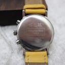 Back view of the stainless steel case of the Mercedes-Benz SLK watch, showing 'SLK Mercedes-Benz Design water resistant 3 ATM stainless steel' engraving.