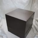Top view of the closed original brown Gucci watch box, with the 'GUCCI' logo embossed on the lid.