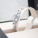 Left side view of the Gucci 102 G-frame watch on its display stand, within its original Gucci box.