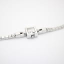 Overhead view of the Gucci 102 G-frame watch and its bracelet laid flat on a white background.