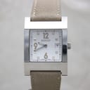 Front view of Gucci 7700M with silver sunburst square dial, applied numerals 12, 6, 9, date window, and beige leather strap.