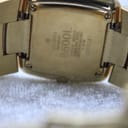 Close-up of the gold-tone case back showing 'Gucci', '8500L', 'Swiss Made', 'Stainless Steel', 'Water Resistant 3 ATM', and serial number '0009287'.