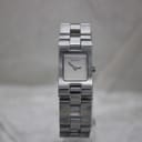Front view of the Gucci 2305L ladies' watch, showing the rectangular silver minimalist dial and stainless steel bracelet against a light background.