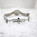 View of the open butterfly clasp on the integrated two-tone stainless steel bracelet of the Gucci 8900L.