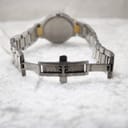 Rear view of the Gucci 8900M watch's deployant clasp, showing its open mechanism and brushed finish.