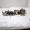 Opposite side profile view of the Gucci 8900M watch and its integrated two-tone bracelet.