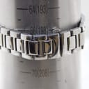 Close-up of the Gucci 8900M bracelet on a wrist sizing gauge, indicating a maximum wrist circumference of approximately 198mm or 19.8cm.