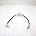 Full view of the Gucci 102 watch with its black leather cord strap unclasped, laid out on a soft white surface.