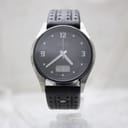 Straight-on front view of the Junghans Mega Solar watch with its black dial, showing day 'TH' and date '11'.
