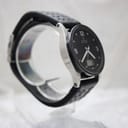 Right side profile view of the Junghans watch, highlighting the case profile and black leather strap.