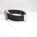 Side view of the watch strap, showing the construction and the case back details.