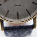 Close-up of the silver sunburst dial showing "23 JEWELS" and "USSR" text.