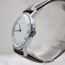 Angled side view of the Timex watch showing the chrome-plated case and crown on the right.