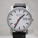 Front view of the Mondaine 30300 watch with its iconic white dial, bold black hour markers, and signature red seconds hand, showing the date at 3 o'clock.