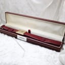The Corteal watch with its burgundy leather strap presented inside a long H.Samuel watch box, labelled "Corteal".