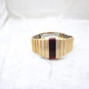 Angled front view of the gold-plated La Générale LED watch, showcasing its integrated bracelet and the dark, rectangular red display window.