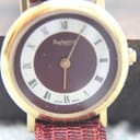 Close-up angled view of the Burberrys dial and gold-tone case, highlighting the mineral glass.