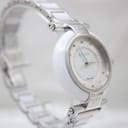 Three-quarter front view of the Escada Lauren watch, showcasing the full bracelet and elegant design on a clear stand.