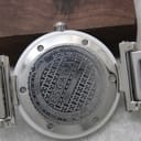 Detailed close-up of the Escada Lauren watch case back, showing engravings for brand, model, reference number, water resistance, and "Swiss Made".
