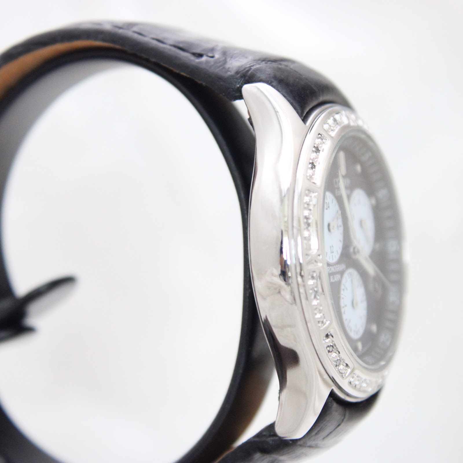 Opposite side view of the Citizen Eco-Drive watch highlighting the polished case and crystal-set bezel.