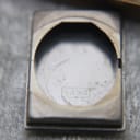 Macro shot of the inside of the case back, clearly showing the model reference number '9464' stamped on the metal.