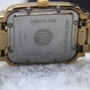 Detailed view of Raymond Weil Saxo watch dial with Roman numerals and date window at 6 o'clock.