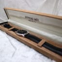 The Raymond Weil 5571 watch resting inside its original presentation box.