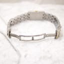 View of the opened bi-tone stainless steel bracelet clasp, showing the internal mechanism and links.