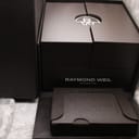 Opened Raymond Weil outer box, revealing the inner presentation box and a sleeve for documentation
