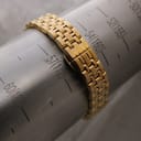 Watch bracelet wrapped around a wrist sizing gauge, indicating a wrist circumference measurement of approximately 170mm.