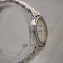 Another side view of the Raymond Weil 5377 watch, highlighting the polished stainless steel case and bracelet links.