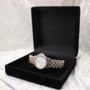 Raymond Weil Genève 5377 watch displayed in an open black watch box, showcasing its elegance.